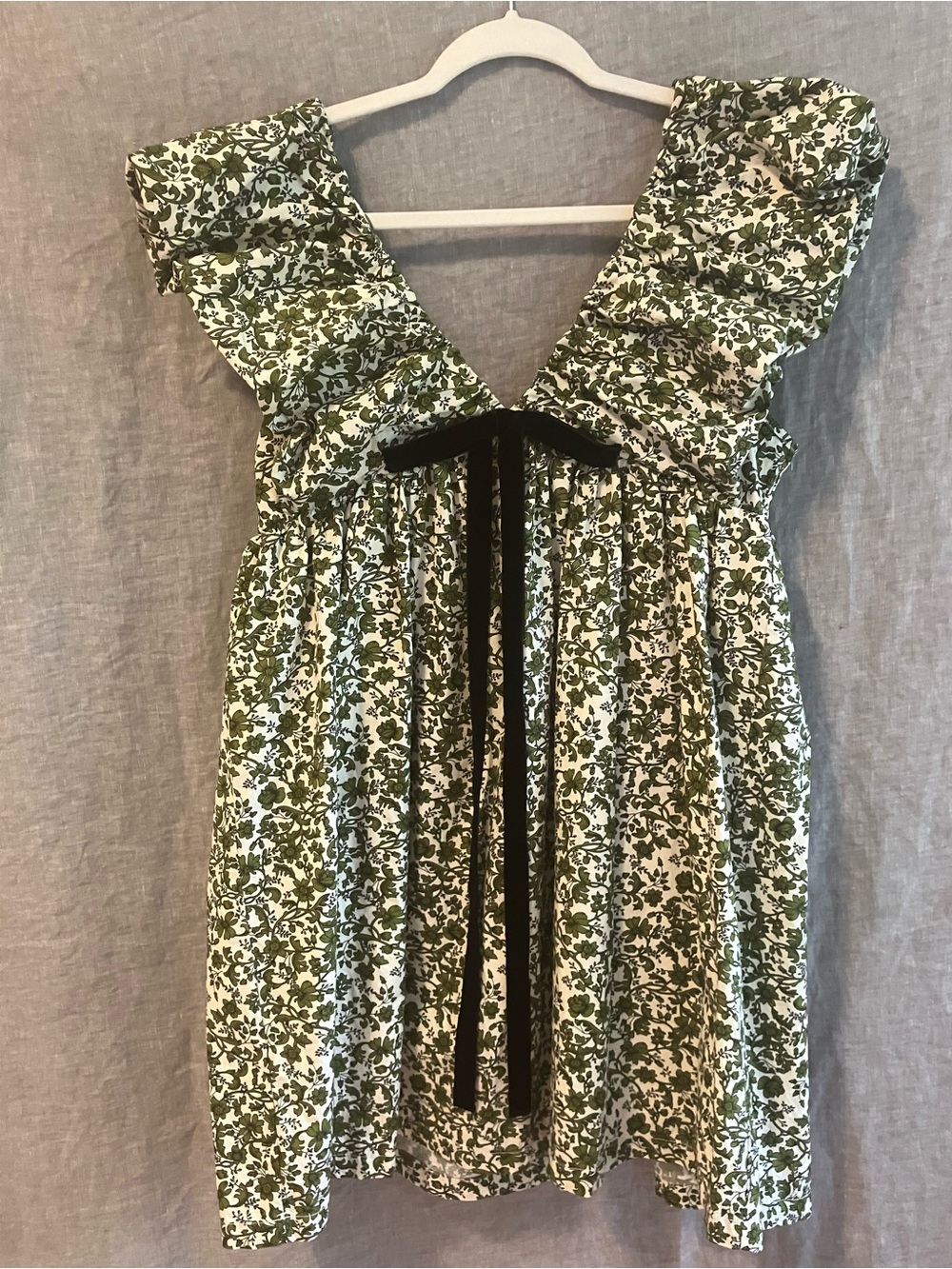 Green floral dress with black velvet bow by O.P.T.